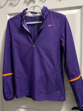 NEW WITH TAGS WOMEN’S NIKE GOLF WINDBREAKER